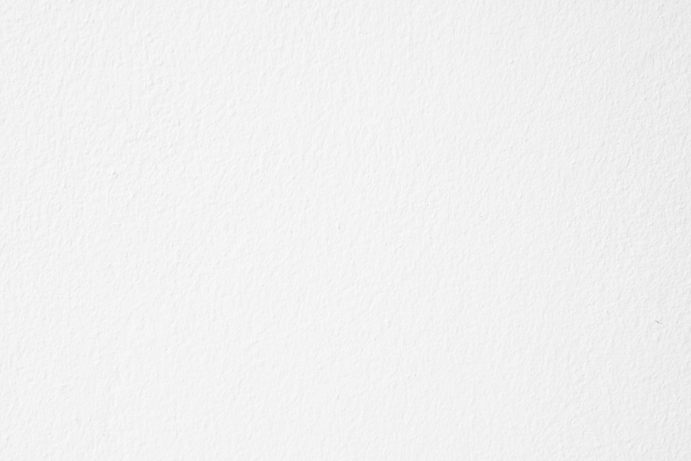 White textured wall background.
